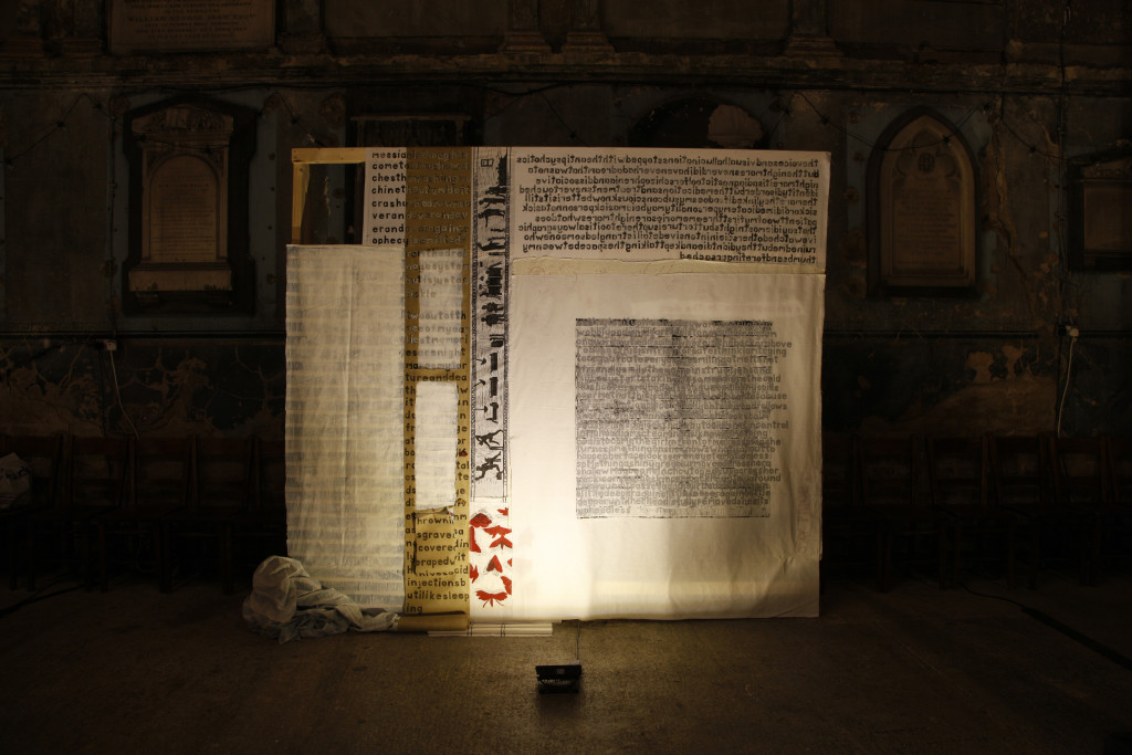 JPRICE_schizophrenicinthedark_SITD_2017, hand carved letters printed one at a time, relief carving, clay, textiles, pen, matches, ink, stitch, 273cm x 239cm